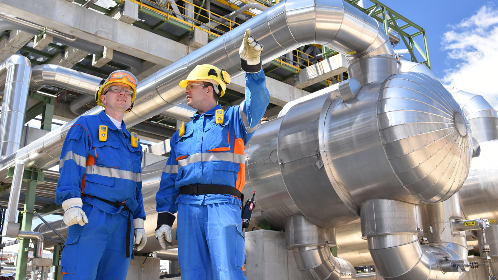 Two workers at a manufacturing plant